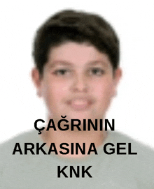 a picture of a young boy with the words cagrinin arkasina gel knk written below him