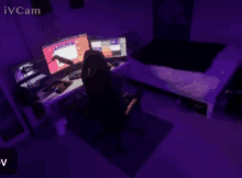 a dark room with purple lights and ivcam written on the bottom