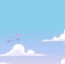 a group of birds are flying in the sky and one of them is holding something up