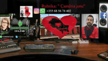 a computer monitor with a red heart on it that says camera