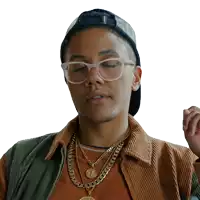 a man wearing glasses and a hat looks down