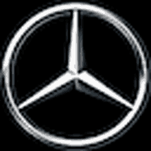 a white mercedes benz logo is on a black background .