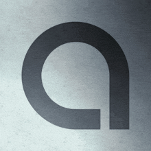 the letter a is shown in a circle on a gray background