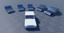 a white car is surrounded by blue cars