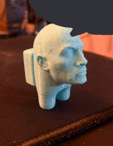 a 3d printed statue of a man 's head