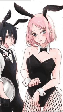 a girl with pink hair and bunny ears stands next to a boy in a tuxedo