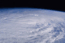 a view of the earth from space shows a large cloud