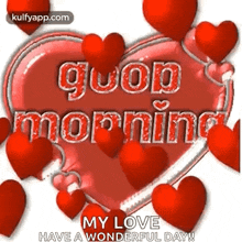 a heart with the words `` good morning my love have a wonderful day '' surrounded by red hearts and balloons .