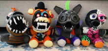 five nights at freddy 's stuffed toys are sitting on a carpet