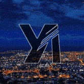 a city at night with the letter y and i in the foreground