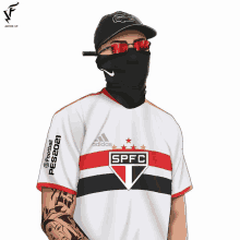 a drawing of a man wearing a shirt that says spfc on it