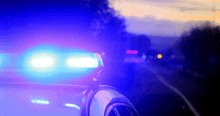 a close up of a police car with blue lights