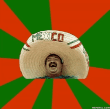 a man wearing a sombrero that says mexico