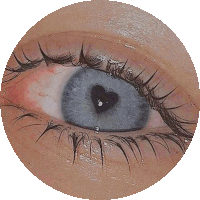 a close up of a person 's eye with a heart on it