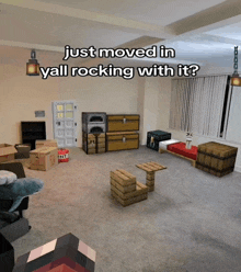 a living room filled with boxes and a tnt box on the floor