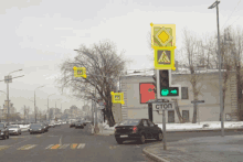 a car is driving down a street with a stop sign in front of it