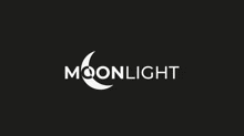 a moonlight logo with a crescent moon on a black background