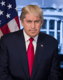 a man in a suit and tie with a fake donald trump wig