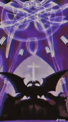 a purple background with a bat and a cross on it