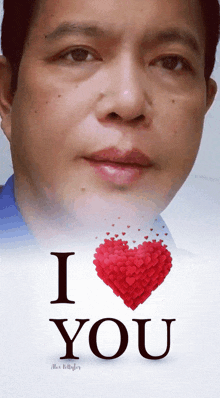 a man 's face is on a poster that says " i love you "