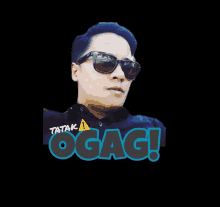 a man wearing sunglasses and a shirt that says " ogag "