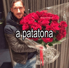 a man is holding a large bouquet of red roses with the words a patatona above him