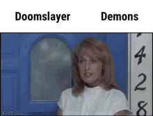 a woman is standing in front of a blue door with the words doomslayer and demons written on it .