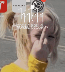 a phone screen shows the time as 11:11 on monday october 17