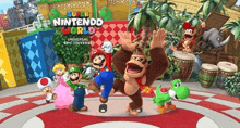 a poster for super nintendo world featuring mario luigi donkey kong princess peach and yoshi