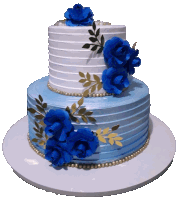 a blue and white cake with blue flowers on it