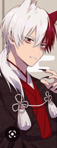 a boy with white hair and red eyes is wearing a black kimono and a red tie .