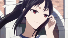 a girl with black hair and red eyes is looking at the camera