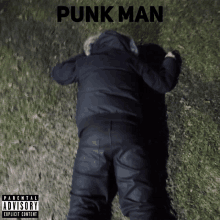 a punk man album cover shows a man laying on the ground