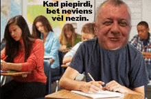 a man sits at a desk in front of a group of students with a caption that says kad piepirdi