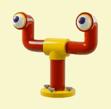 a red and yellow toy with eyes on a yellow base .