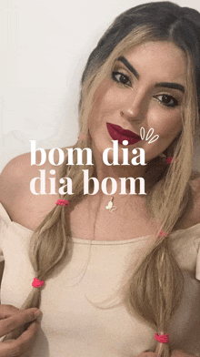 a woman wearing red lipstick and braids has the words bom dia dia bom below her