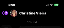 a phone screen shows a message from christine vieira at 1:18 pm