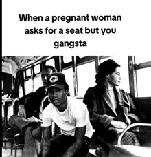 a man wearing a green bay packers hat sits on a bus