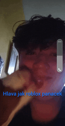 a man eating a banana with the words " hlava jak roblox panacek " on the bottom