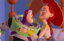 buzz lightyear and jessie from toy story are hugging each other and looking at each other .