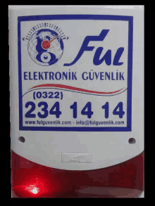 a sign that says ful elektronik güvenlik with the phone number 234 14 14