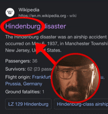 a wikipedia page with a picture of a man with glasses