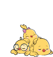 three yellow chicks are laying on top of each other with the letter gn behind them