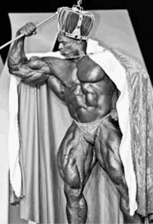 a black and white photo of a bodybuilder wearing a crown and robe .