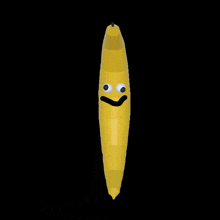 a yellow pencil with googly eyes and a smile on it 's face