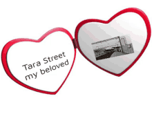 two heart shaped mirrors with tara street my beloved written on one