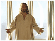 a man in a white robe is standing with his arms outstretched