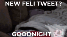 a picture of a person laying on a bed with the words " new feli tweet goodnight "