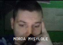 a close up of a man 's face with the words morda mysylole in white letters