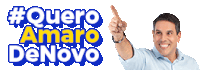 a man is pointing up in front of a #quero amaro denovo logo